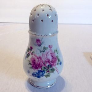 Vintage porcelain powder/sugar shaker or hat pin holder.
